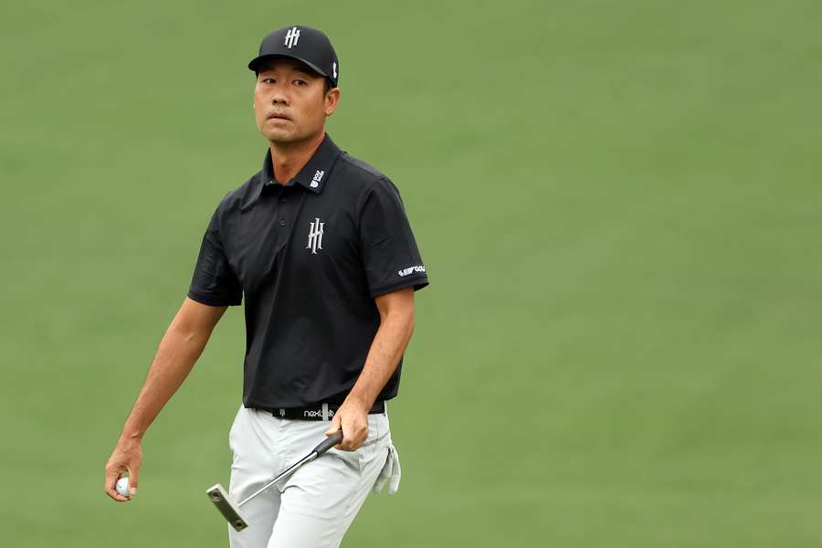 Kevin Na reacts on the second green during the first round