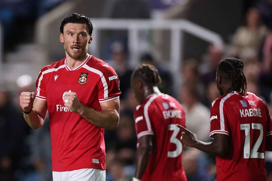 Kieffer Moore of Wrexham celebrates scoring his team’s second goal Kieffer Moore of Wrexham celebrates scoring his team’s second goal