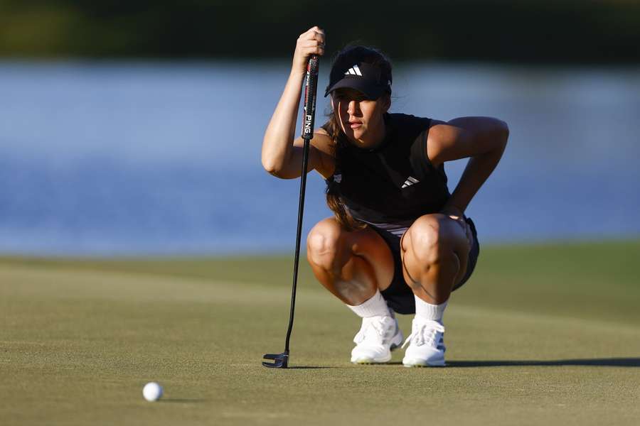 Grant looks on Grant looks on