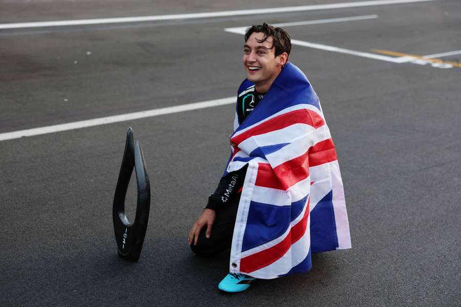 Russell celebrates his victory Russell celebrates his victory