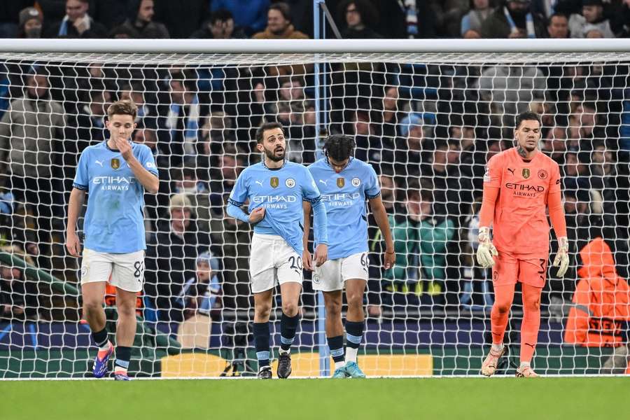 Manchester City's James McAtee, Bernardo Silva, Jahmai Simpson-Pusey and Ederson look dejected