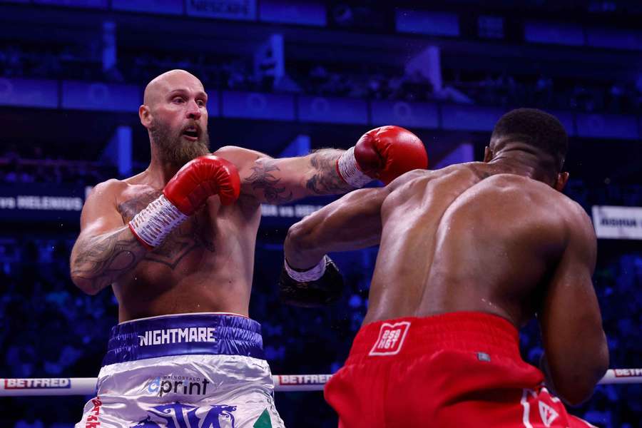 Helenius (L) in action against Joshua