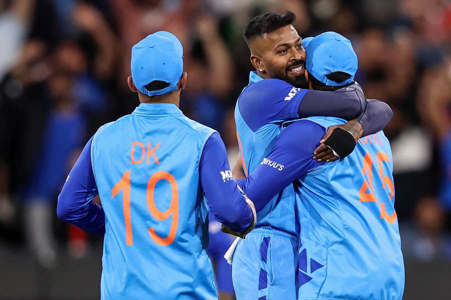 Pandya (centre) celebrates eith his team