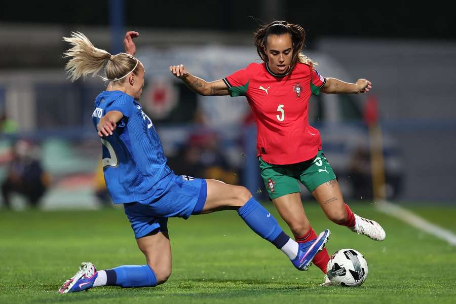 Portugal's Joana Marchao is challenged by Finland's Emma Koivisto Portugal's Joana Marchao is challenged by Finland's Emma Koivisto
