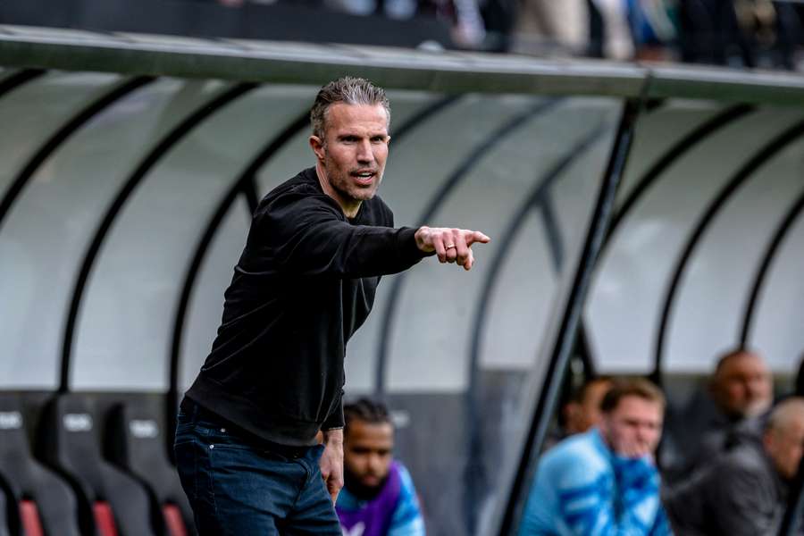Van Persie on the touchline for Feyenoord Van Persie on the touchline for Feyenoord