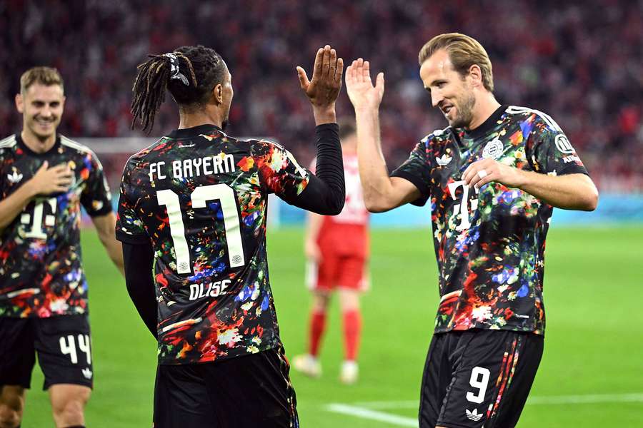 Michael Olise and Harry Kane celebrate Michael Olise and Harry Kane celebrate