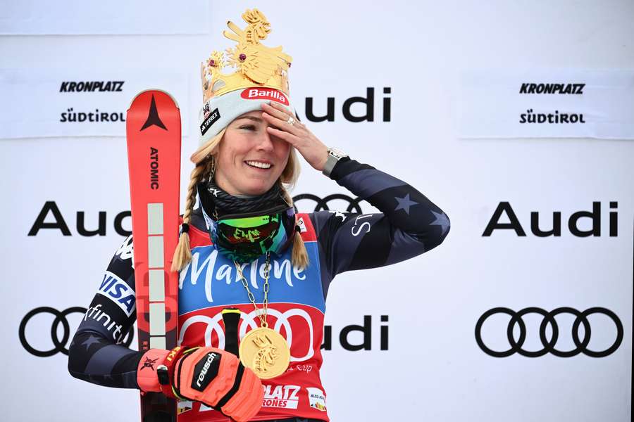 Mikaela Shiffrin celebrates on the podium