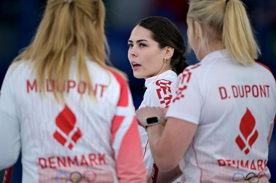 Jasmin Holtermann in action during the Winter Olympics with Madeleine Dupont and Denise Dupont