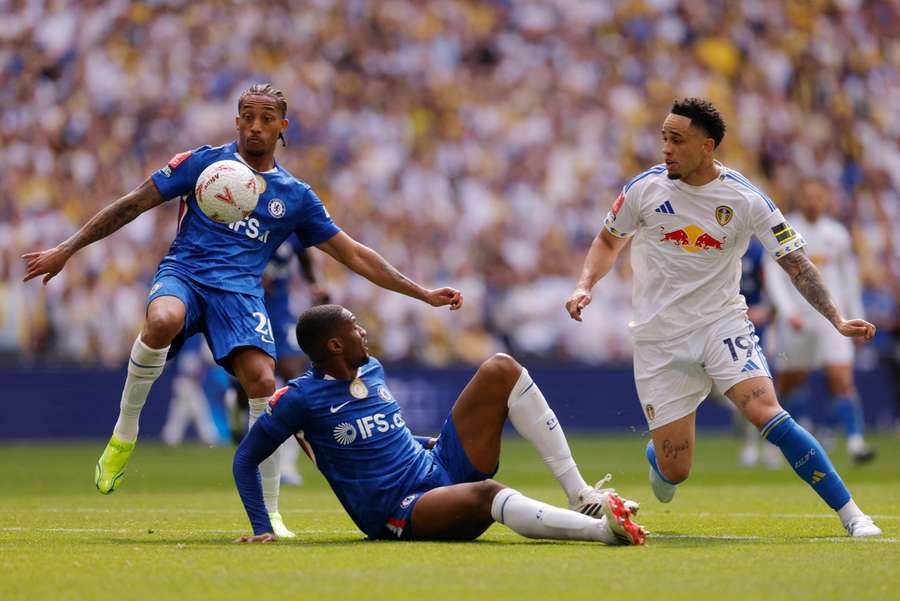 Joao Pedro (L) in action for Chelsea
