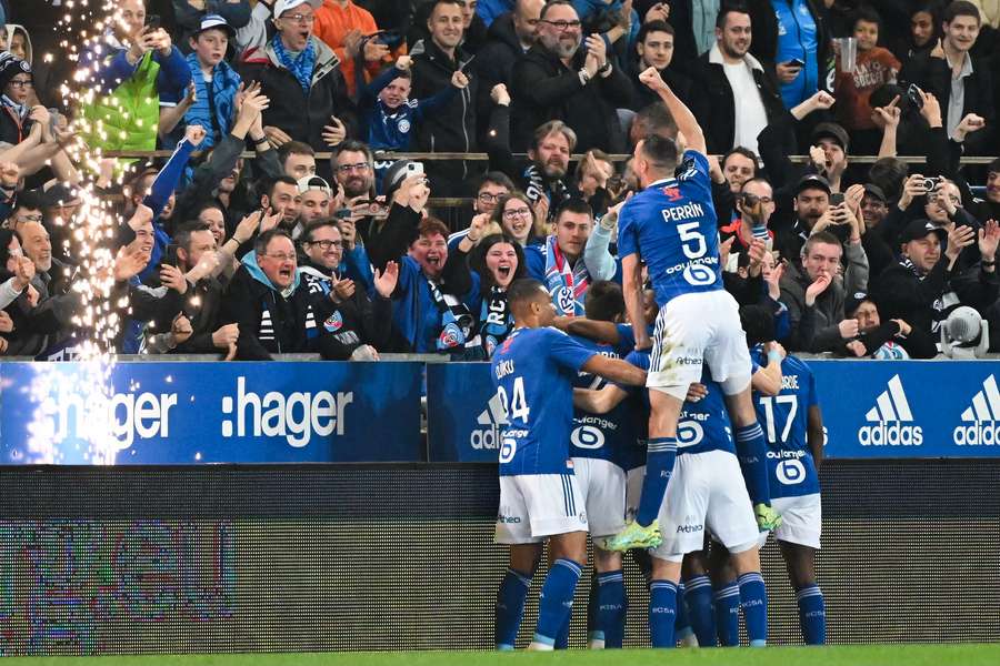 Strasbourg celebrate the opening goal by Sanson