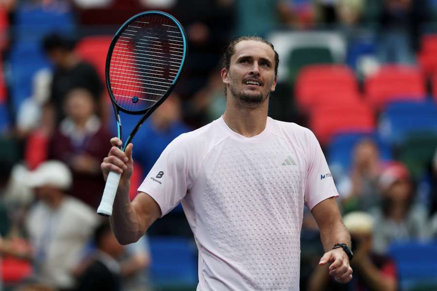 Alexander Zverev celebrates winning his second-round match against Yibing Wu