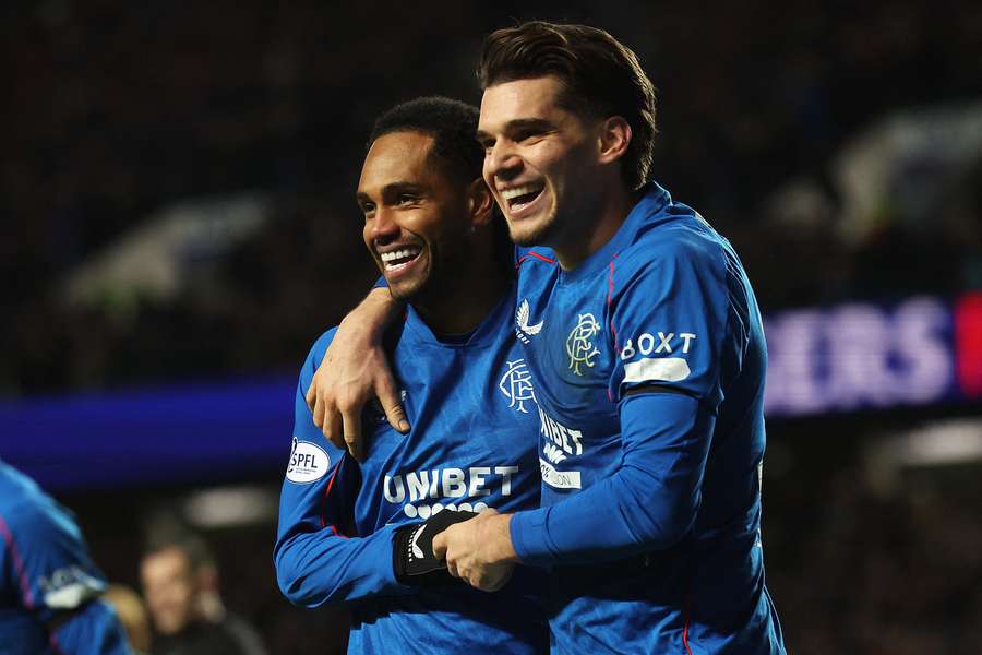 Rangers' players celebrate a famous win