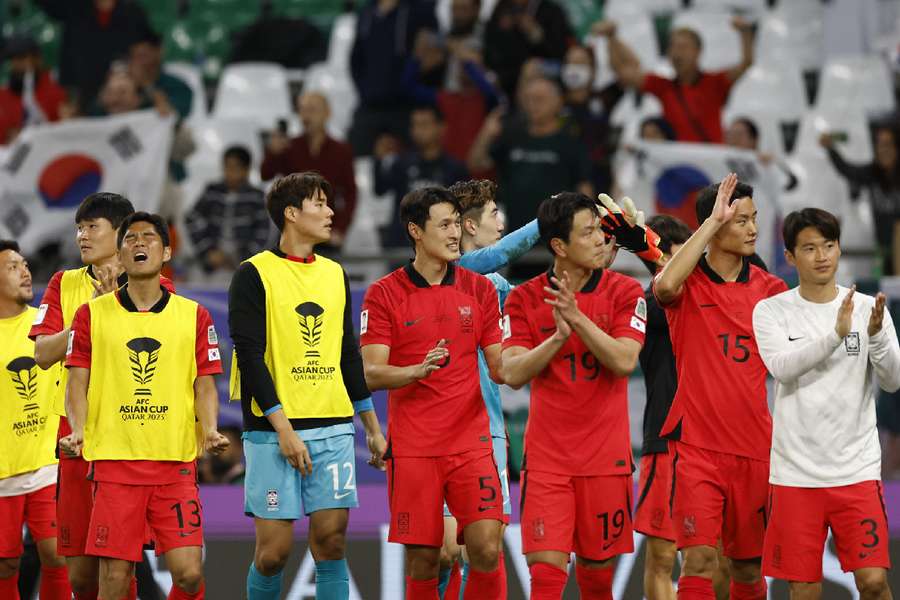 South Korean players celebrate after the match