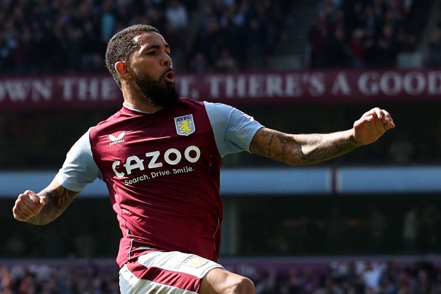 Douglas Luiz celebrates scoring Aston Villa's second goal against Spurs