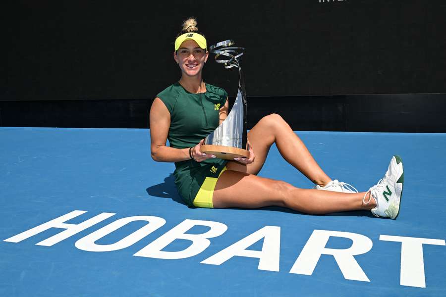 Kessler posing with the trophy in Hobart