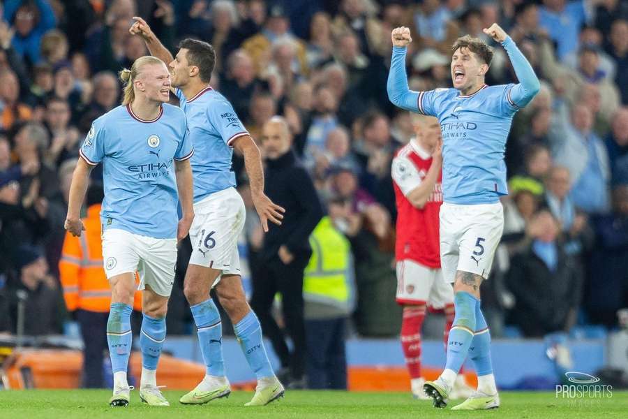 Manchester City players celebrate during their 4-1 victory over Arsenal