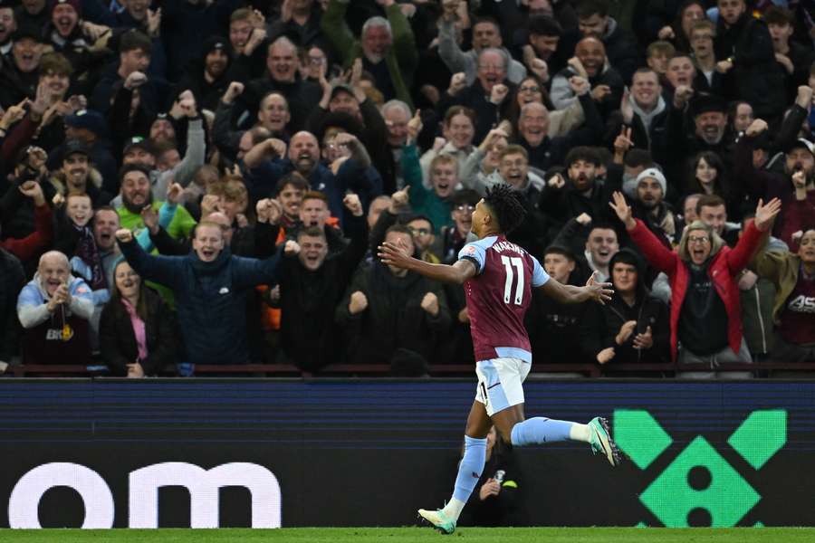 Aston Villa's English striker Ollie Watkins celebrates after scoring their third goal