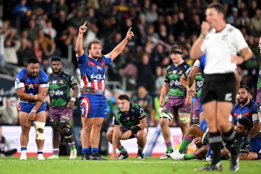 Pouri Rakete-Stones celebrates at the final whistle during the Hurricanes' Super Rugby Pacific win.