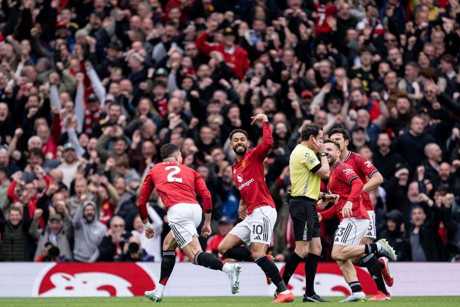 Man Utd's Matheus Cunha celebrates scoring against Liverpool 