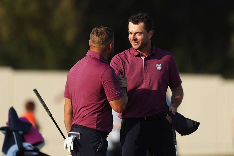 Laurie Canter (R) and Jordan Smith of Team Great Britain & Ireland celebrate victory