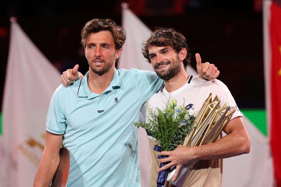 Monaco's Valentin Vacherot celebrates with the trophy and France's Arthur Rinderknech after winning the final in Shanghai Monaco's Valentin Vacherot celebrates with the trophy and France's Arthur Rinderknech after winning the final in Shanghai