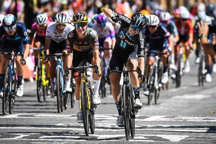 Lorena Wiebes celebrates taking the first stage of the race ahead of Marianne Vos