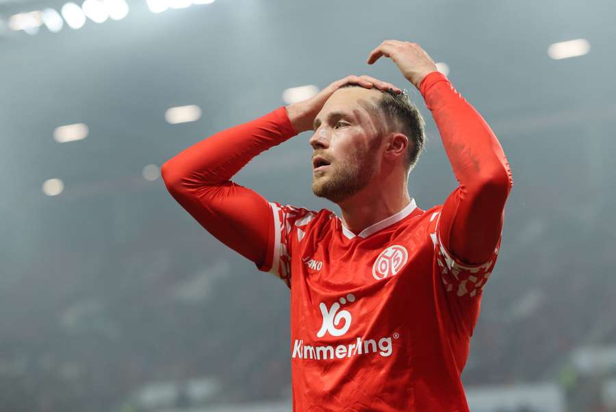 Silvan Widmer of Mainz walks off dejected after being substituted against Borussia Monchengladbach