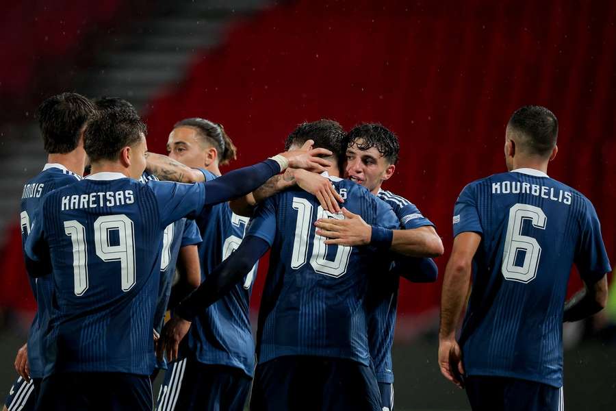Greece celebrate against Serbia