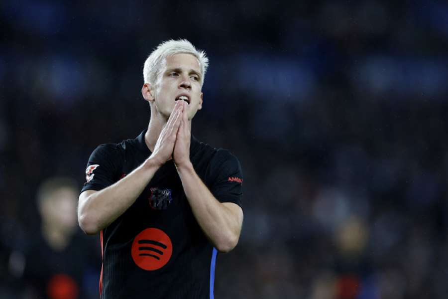 Dani Olmo reacts after missing a chance to score