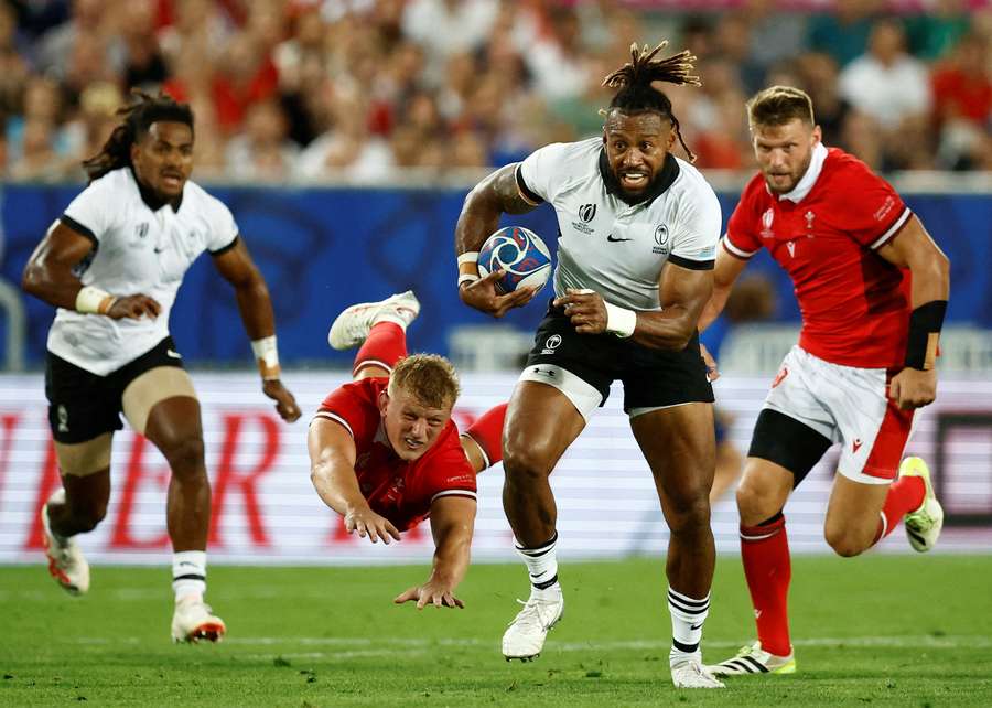 Fiji captain Nayacalevu on his way to scoring a try