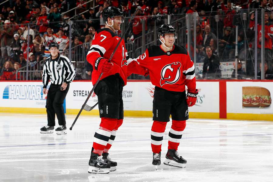 New Jersey Devils' Dougie Hamilton (left) celebrates a goal with Jesper Bratt (right New Jersey Devils' Dougie Hamilton (left) celebrates a goal with Jesper Bratt (right