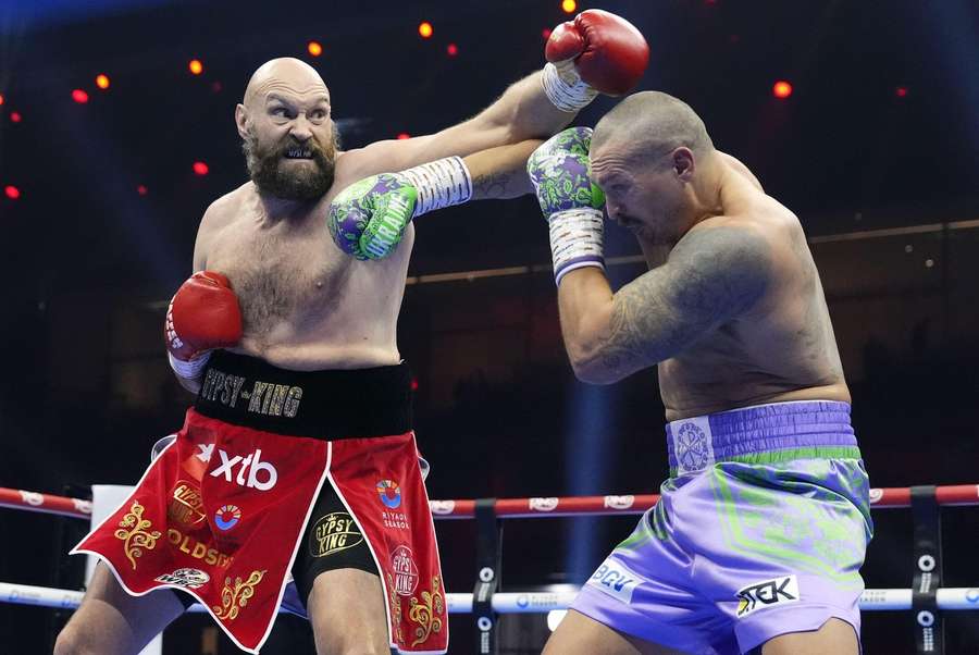 Tyson Fury (L) has challenged Oleksandr Usyk to a third fight