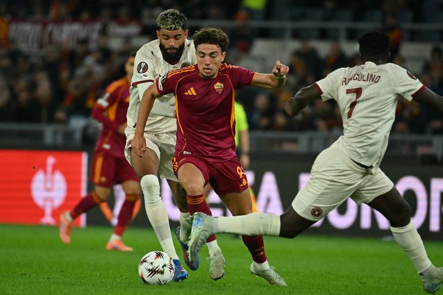 El Aynaoui tra due avversari El Aynaoui tra due avversari