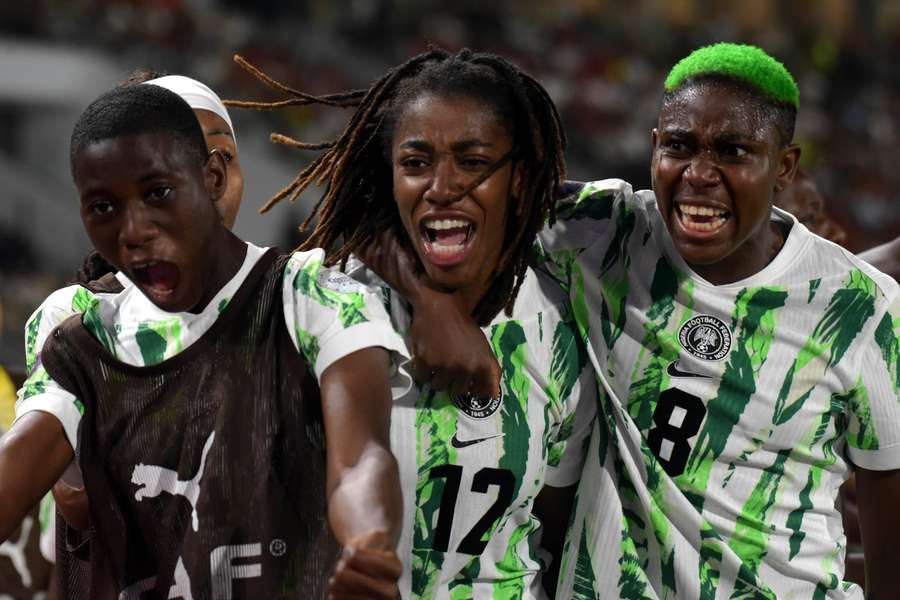 Nigeria players celebrate goal in the WAFCON final