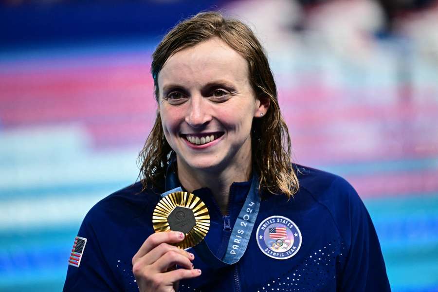 Gold medallist US' Katie Ledecky celebrates during the podium ceremony of the women's 800m freestyle swimming