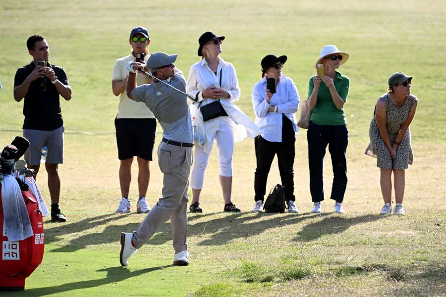 Scott is in the lead after the third round of the Australian Open