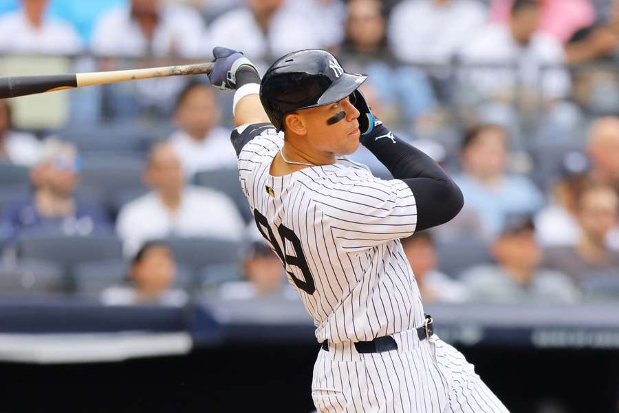 Aaron Judge of the New York Yankees hits a two-run home run in the fourth inning against the Milwaukee Brewers at Yankee Stadium 
