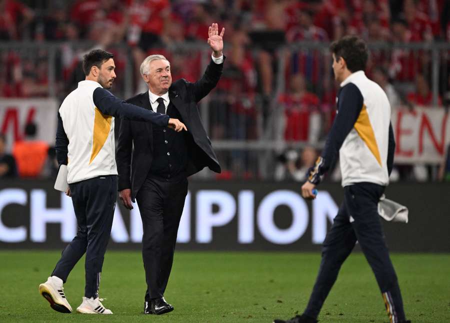Real Madrid's Italian coach Carlo Ancelotti waves after the UEFA Champions League semi-final first leg football match