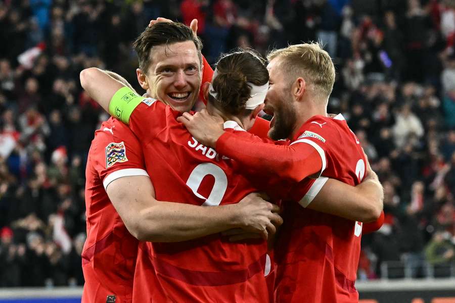 Austria's Michael Gregoritsch (left) celebrates a goal with teammates