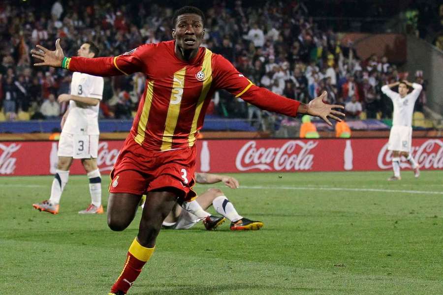 Asamoah Gyan celebrates at the 2010 World Cup