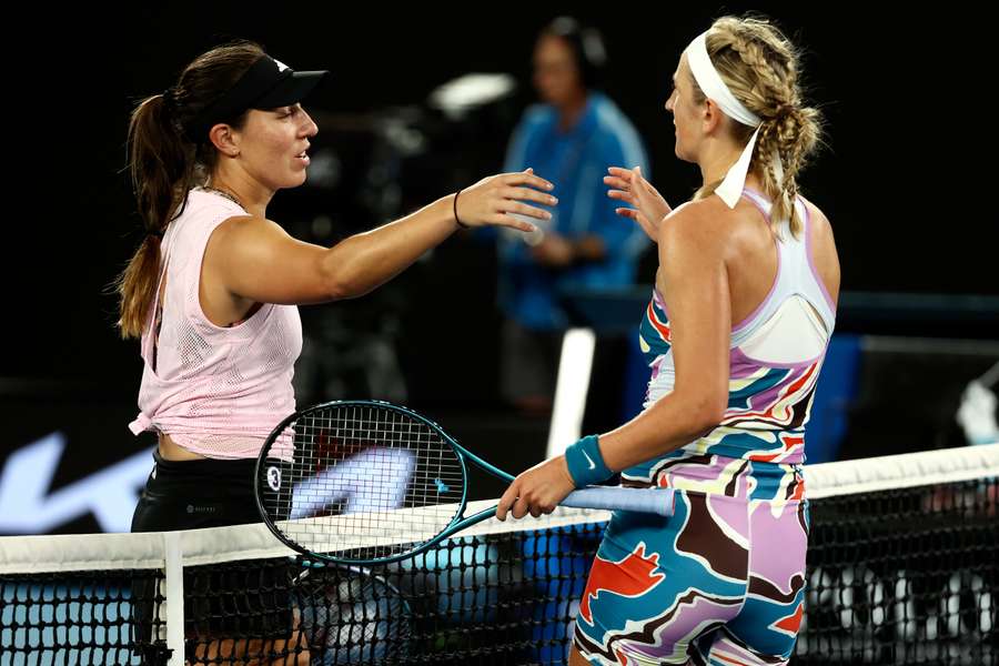 Victoria Azarenka (R) shakes hands with Jessica Pegula after their women's singles quarter-final match