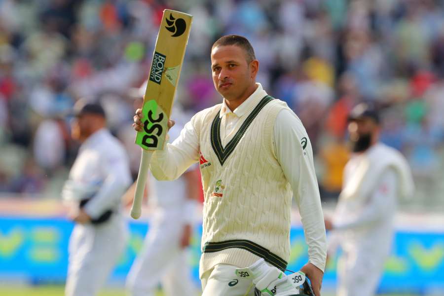 Australia's Usman Khawaja acknowledges the applause from the crowd as he leaves unbeaten on 126 at the end of play