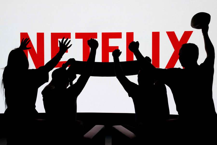 Football fans in front of the Netflix Logo (2024)