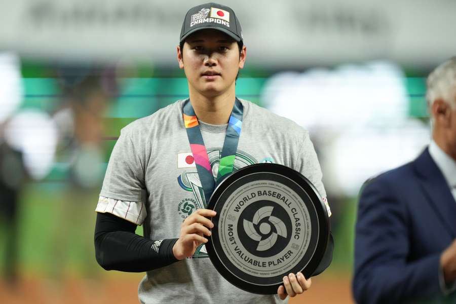 Ohtani poses with the MVP award