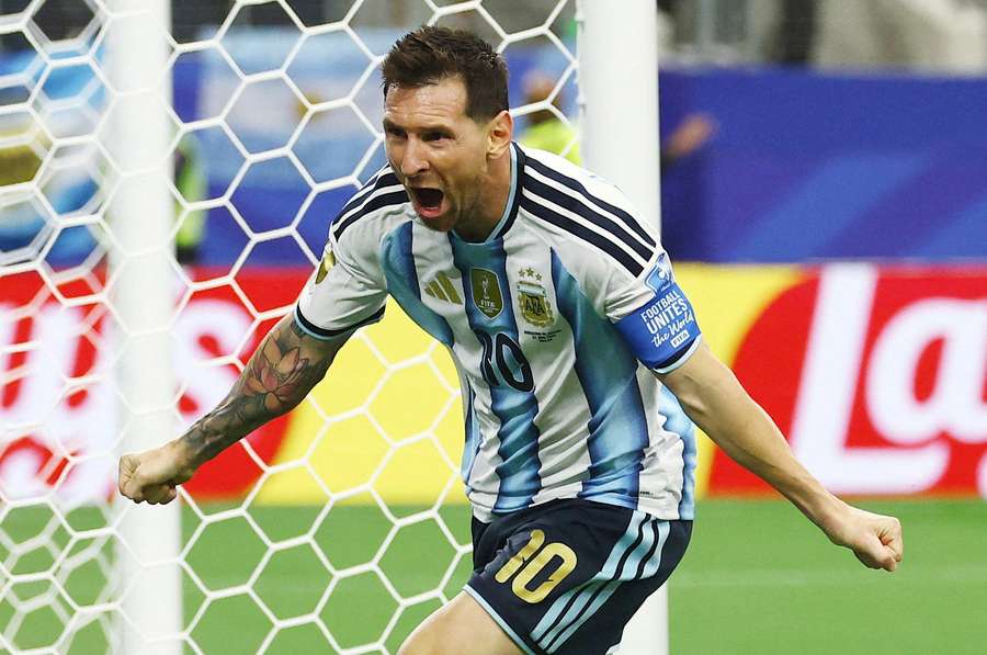 Lionel Messi celebrates scoring Argentina's second goal against Austria Lionel Messi celebrates scoring Argentina's second goal against Austria