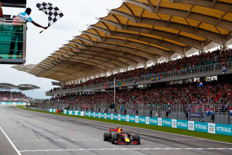 Max Verstappen takes the checkered flag during the Malaysian Grand Prix in 2017 - the last time the event was staged there