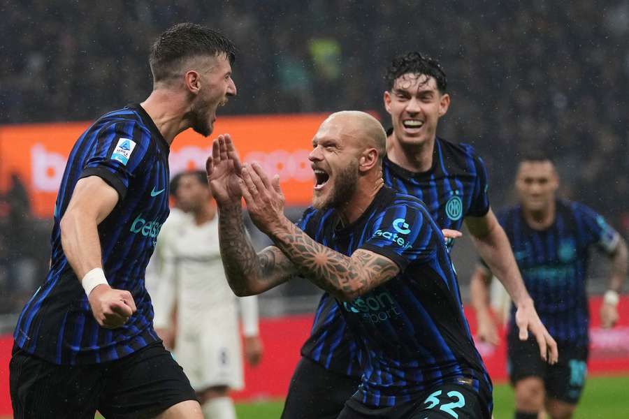 Inter Milan's Petar Sucic celebrates with his teammates Inter Milan's Petar Sucic celebrates with his teammates