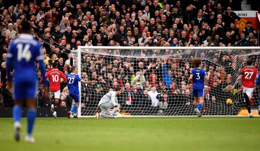 Manchester United's English striker Marcus Rashford scores the team's second goal 