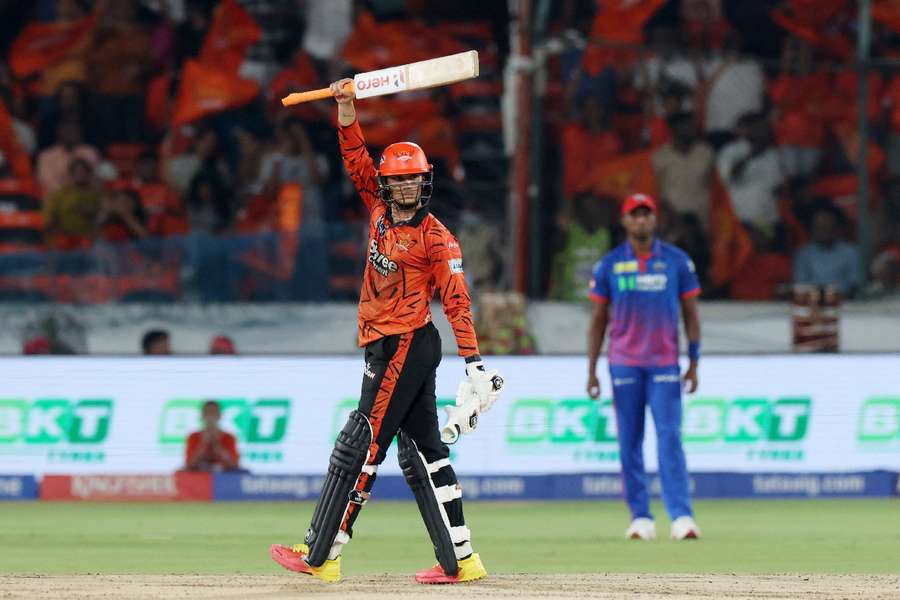 Sunrisers Hyderabad's Abhishek Sharma celebrates after reaching his century