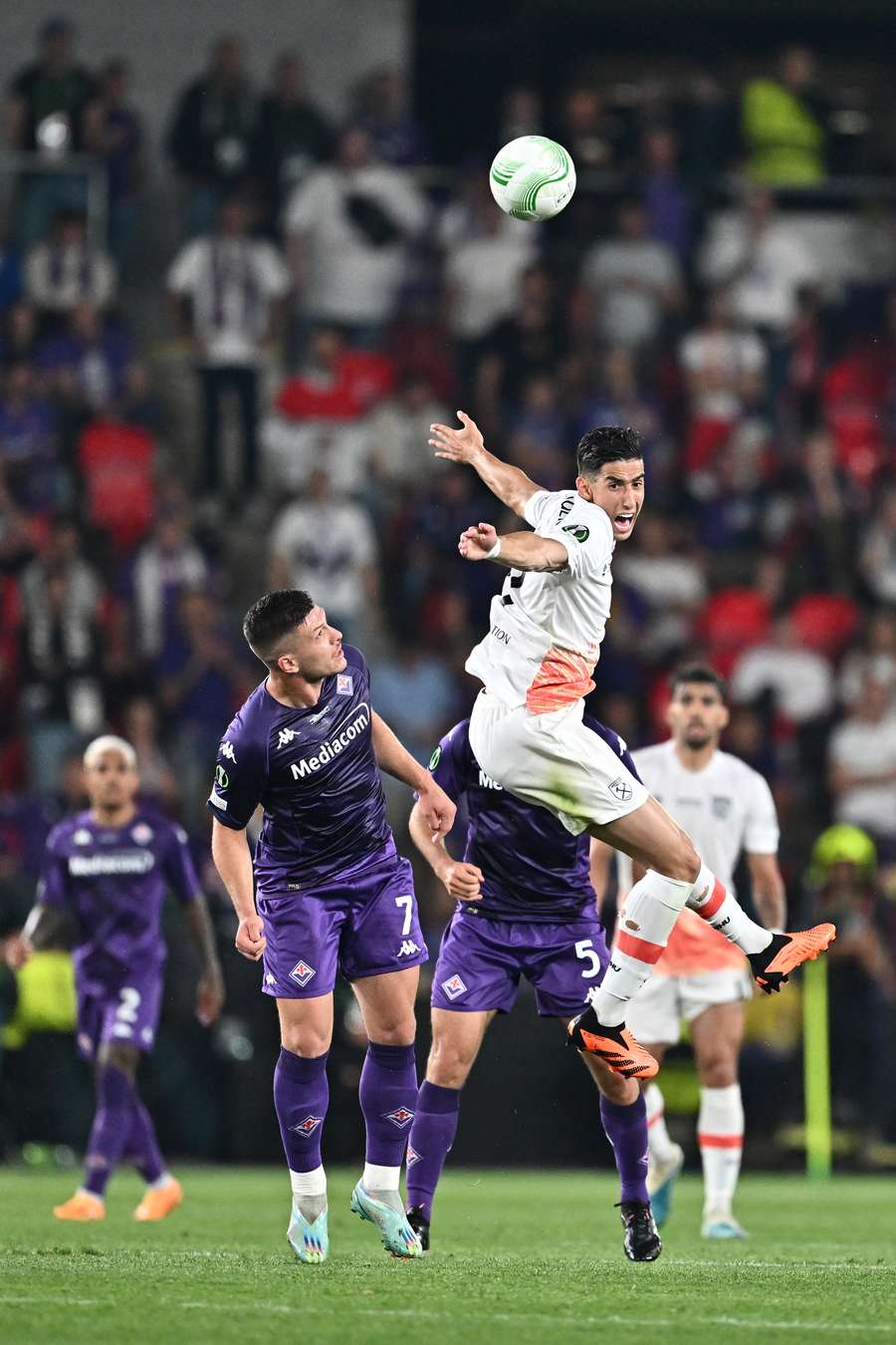 Nayef Aguerd and Luka Jovic battle for the ball